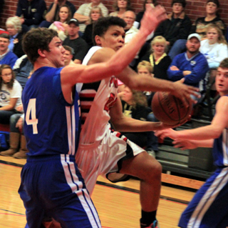 Tyler Hankerson goes for a lay-up against Genesee.