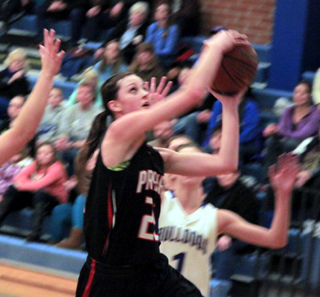 Kyndahl Ulmer scores 2 of her game-high 25 points at Genesee.