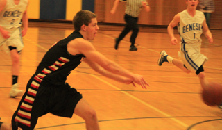 On a fast break at Genesee Isaiah Shears makes a pass across the lane. Lucas Arnzen wound up making a lay-up on the play.