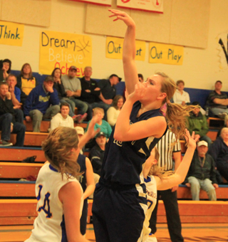 Sarah Chmelik shoots against Nezperce for Summit.