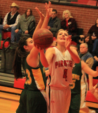 Shayla VonBargen slips past a Potlatch defender for a lay-up.