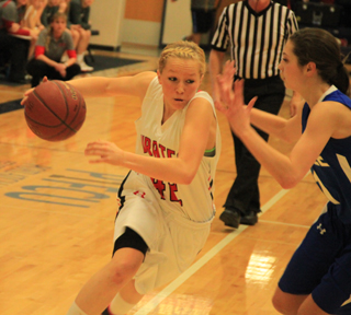 Sky Wilson drives past a Genesee defender.