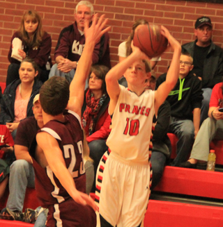 Jared Higgins shoots one of his three 3-pointers against Kamiah.