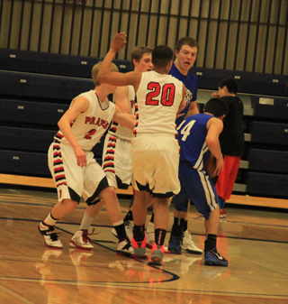 Rhett Schlader, Lucas Arnzen and Tyler Hankerson were part of the tough defense Prairie played against Genesee Monday as they held the Bulldogs to just 22 points, only 5 in the first half.