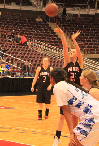 Kyndahl Ulmer shoots one of Prairies 42 free throws against Lapwai. Prairie made 30 of them. Also shown are Keely Schmidt in the back and Kayla Schumacher at right.