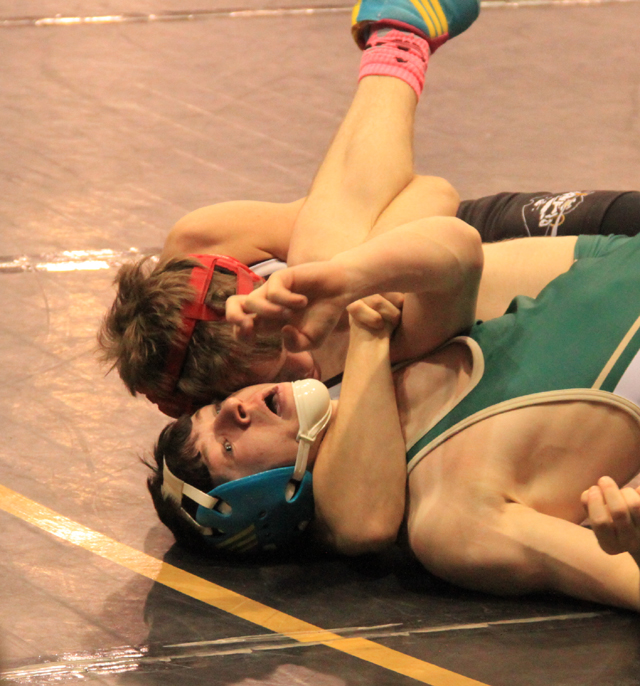After trailing for the entire match, Dally Ratcliff stunned Cody Edwards of St. Maries, getting him cradled for a pin that clinched a state medal.