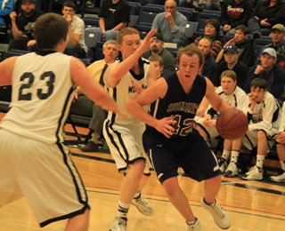 Matthew Schwartz handles the ball in the Deary game.