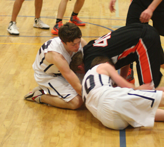 Patrick Chmelik and Josh Lustig battle for a loose ball in the Kendrick game.
