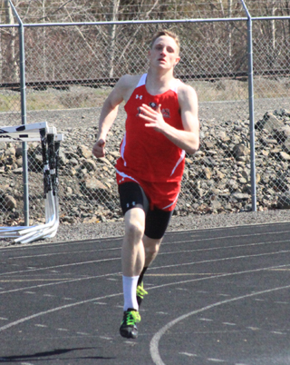 Lucas Arnzen was way out in front as he rounded the final turn of the 400 meter dash. He wound up winning easily.