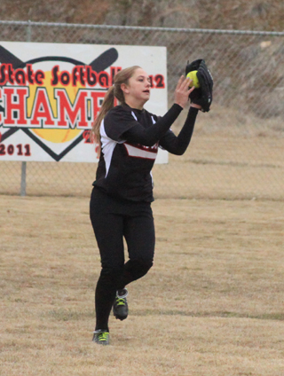 Kylie Tidwell makes a catch in centerfield against Troy.