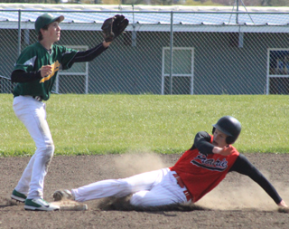 Jake Bruner slides into second against Potlatch.