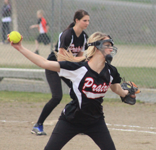Leah Holthaus winds up for a pitch against C.V. She tossed a no-hitter in the game. In the background is first baseman Hanna Ross.