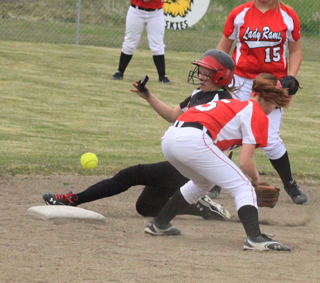 Sky Wilson is safe at second with a stolen base as the ball gets away from the C.V. fielders.