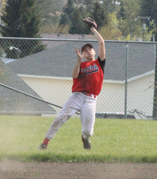 Brandon Anderson managed to hang on to the ball despite stumbling backwards on this play against Highland.