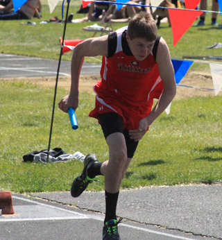 Bryson Higgins gets out of the starting blocks in the 4x200.