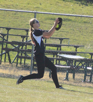 Holli Uhlorn nearly let the ball come out on this catch in right field against Genesee.