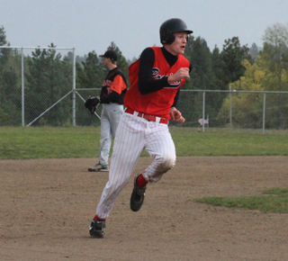 Jake Bruner legs out a triple at Troy and wound up scoring on the play when the throw back to the infield got loose.