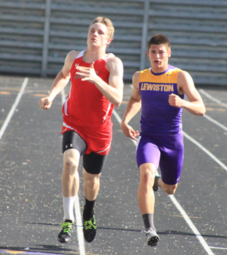 Lucas Arnzen sprints to a 2nd place finish in the 200.