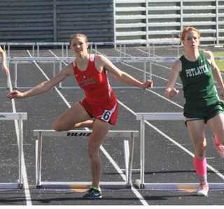 Mykaela McWilliams was running 2nd in the 300 hurdles until clipping this hurdle. She held on for 3rd.