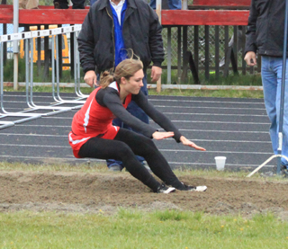 Krystin Uhlenkott landed well out into the pit as she took over first place in the triple jump with a personal best mark at the Regional meet. She also qualified for state in the long jump and 4x100 and 4x400 relays.