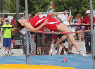 Brandi Gehring cleared a personal best 48 to earn a 4th place medal in the high jump at State.