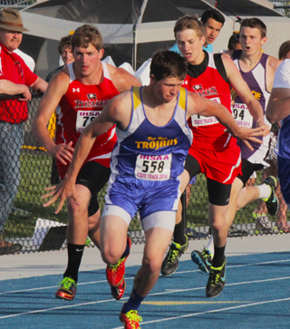 Bryson Higgins hands off to Isaiah Shears in the medley relay. Lucas Arnzen and Peter Spencer ran the final two legs as the team finished 4th.