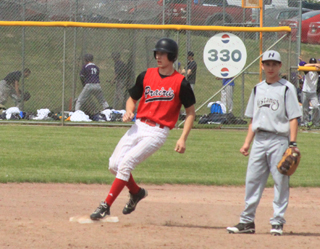 Casey Danly pulls into second after hitting a bases clearing 3-run double against Horseshoe Bend.