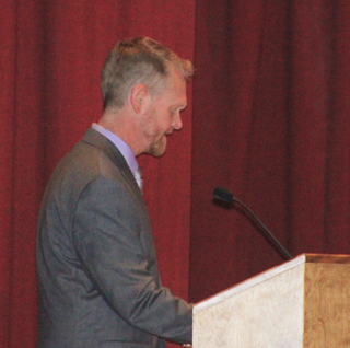 Commencement speaker David Young before he turned the podium so he could address the class directly.