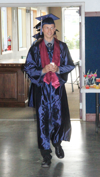 Valedictorian Michael Waters leads the class of 2014 during the processional.