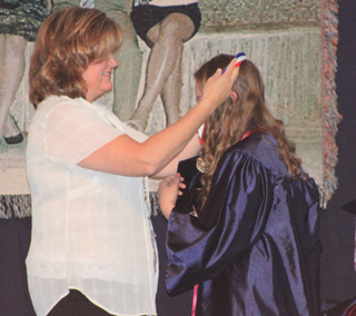 Rachael Frei receives the Congeniality Award from Gina Frei.