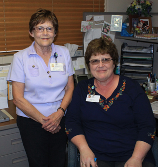 Mary Lorentz and Deb Miller; SMH Financial Counselors are ready to offer financial assistance to the patients of St. Marys Hospital and Clinics. Photo by Cheri Holthaus.