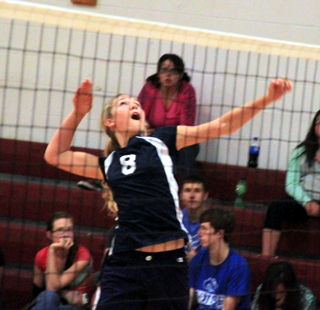 Summits Lauren Stubbers winds up for a spike at Kamiah.