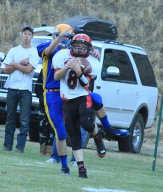 Devin Bruegeman got position on the Salmon River receiver and intercepted the pass.