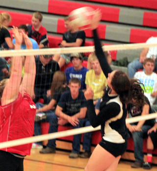 Prairies Shayla VonBargen pounds the ball at C.V.