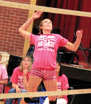 Krystin Uhlenkott winds up for a slam against Grangeville.