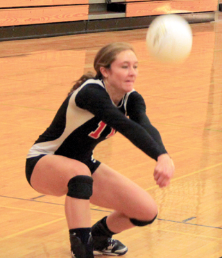 Krystin Uhlenkott digs up a serve against Pomeroy at the Border Battle.