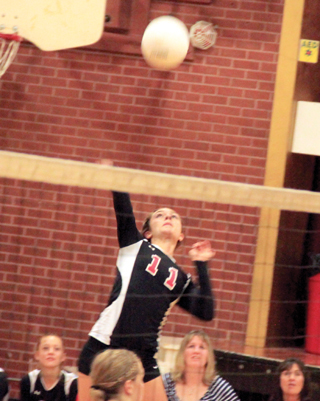 Krystin Uhlenkott goes up for one her 17 kills against Potlatch.