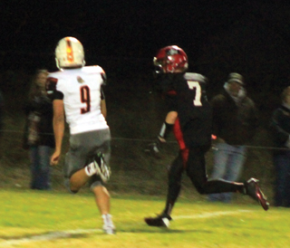 Rhett Schlader was able to outrace this Troy defender to the end zone for a second half touchdown.