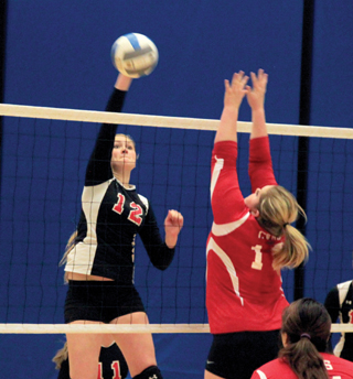 Kayla Schumacher goes for one of her 16 kills against C.V.