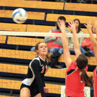 Krystin Uhlenkott was able to cut her spike past the Troy blockers.