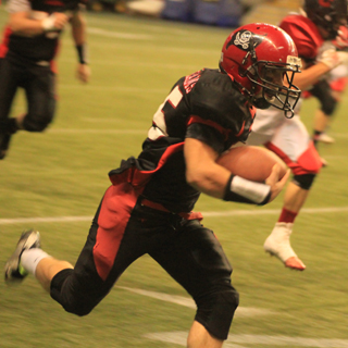 Hunter McWilliams races down the right sideline for a 75-yard touchdown run that gave Prairie a 14-0 load over Oakley.