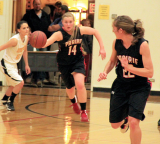 Kayla Schumacher passes ahead to Krystin Uhlenkott after making a steal at Highland.