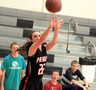 Krystin Uhelnkott puts up a 3-point shot at Highland.