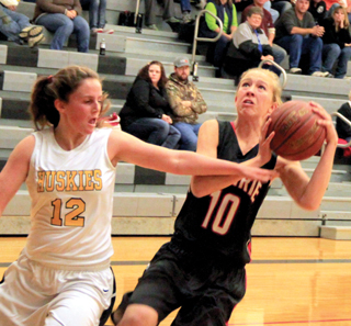 Talyss Lustig got fouled on this shot and made 1 of the 2 free throws.