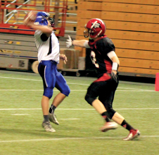Tanner Ross pass rush on this play forced an off-balance throw that became one of 5 interceptions for the Prairie defense.
