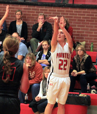 Krystin Uhlenkott shoots from the corner during the second quarter. A similar shoot from the other end of the floor late in the fourth quarter tied the game and helped lead to the win.