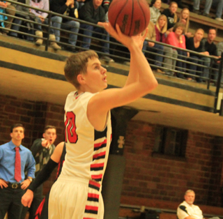 Bryson Higgins has stepped into a starting role for the Pirates and scored in double figures in both games. Here he is shooting at Moscow.