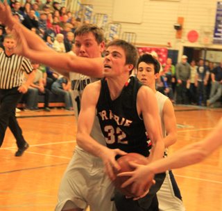 John Mager gets fouled as he tries to shoot at Grangeville.
