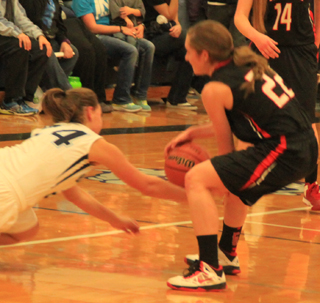 Krystin Uhlenkott steals the ball at Grangeville.