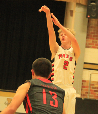 Rhett Schlader puts up a 3-pointer at Moscow.